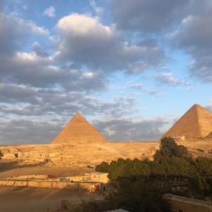 Sphinx palace pyramids view 