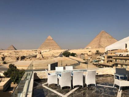 Cleopatra pyramids view - image 12