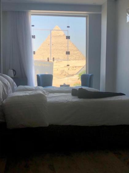 Cleopatra pyramids view - image 13