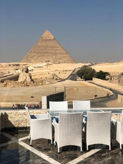 Cleopatra pyramids view - image 18