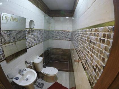 City Hotel - image 18