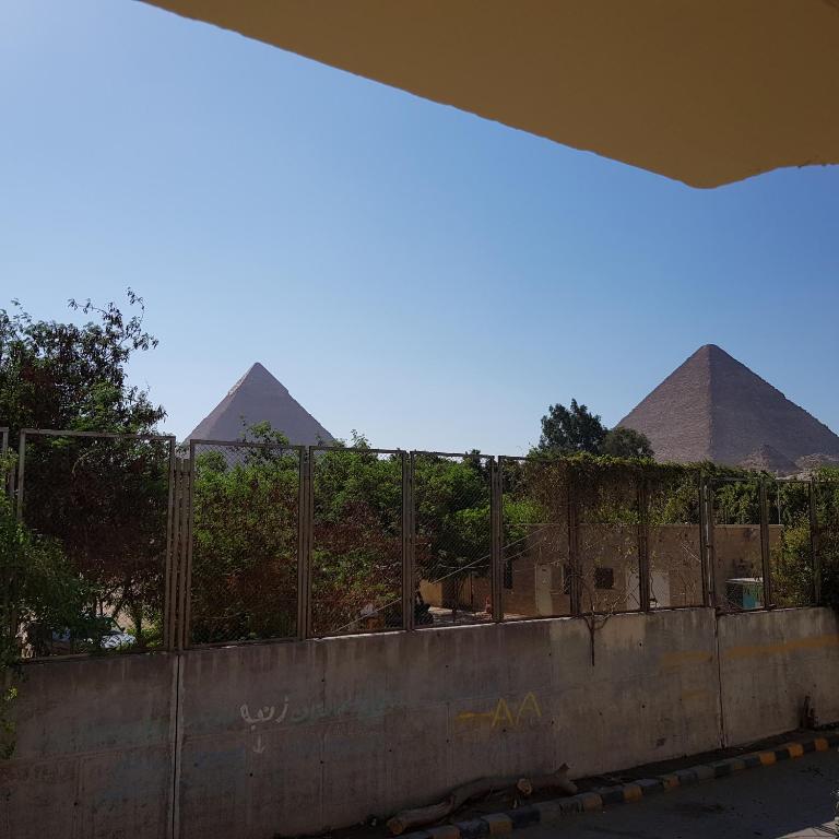 Sphinx palace pyramids view - image 2