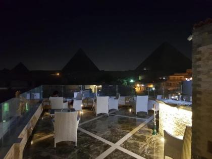 Cleopatra pyramids view - image 17