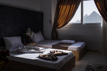 Gardenia Pyramids view inn - image 3