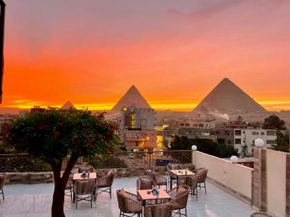 Pyramids Home Inn - image 11