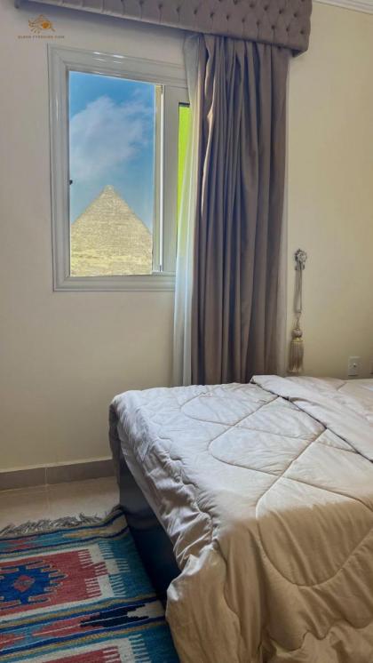 Queen Pyramids View Apartment - image 5