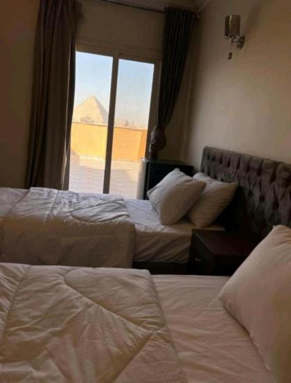 king ramses pyramids view apartment - image 8