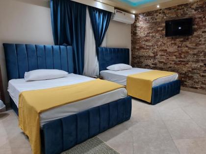 Villa 53 Luxury Suites - غرف فندقية - image 15