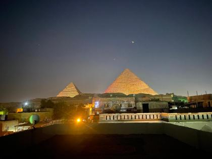 Golden pyramids Guest house view - image 13