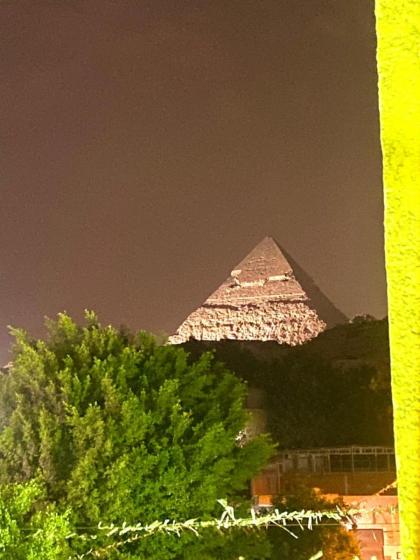 Golden pyramids Guest house view - image 14