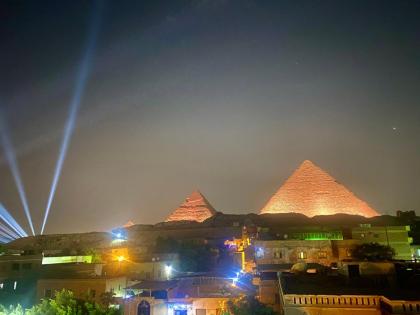 Golden pyramids Guest house view - image 16