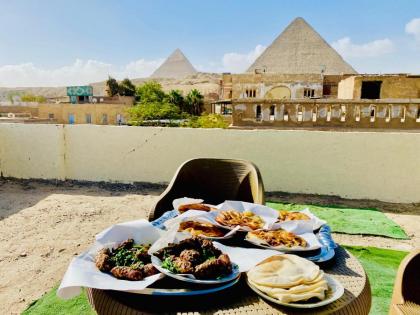 Golden pyramids Guest house view - image 5