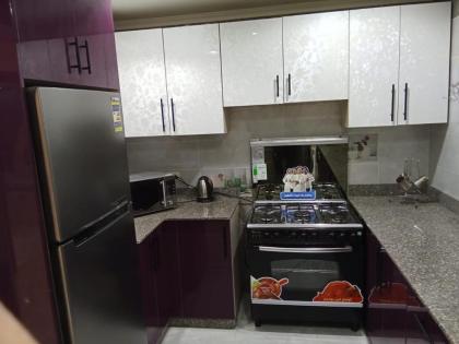 Luxury furnished new apartment al muhandessin شقة جديدة مفروشة سوبر لوكس المهندسين جامعة الدول - image 12