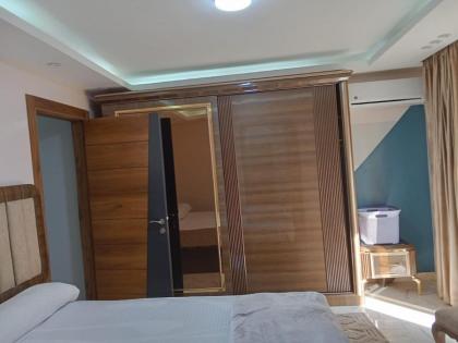 Luxury furnished new apartment al muhandessin شقة جديدة مفروشة سوبر لوكس المهندسين جامعة الدول - image 9