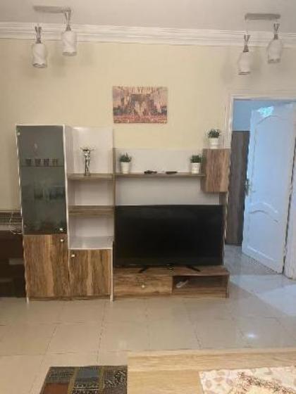 Cozy Warm 2BR Apartment in Madinaty - image 2