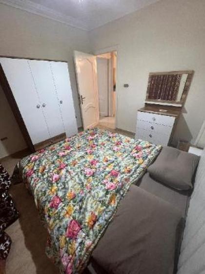 Cozy Warm 2BR Apartment in Madinaty - image 3