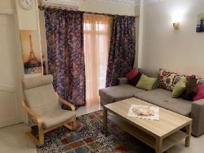 Cozy Warm 2BR Apartment in Madinaty - image 4