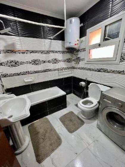 Stylish 2-Bedroom Apartment in Madinaty Compound - image 11