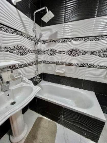 Stylish 2-Bedroom Apartment in Madinaty Compound - image 9