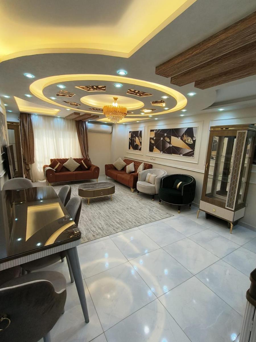شقة واسعة مريحة بكافة الامكانيات والفرش الحديث في المهندسين قريب من النيل والمتحف وجامعة الدول - main image