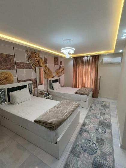 شقة واسعة مريحة بكافة الامكانيات والفرش الحديث في المهندسين قريب من النيل والمتحف وجامعة الدول - image 14