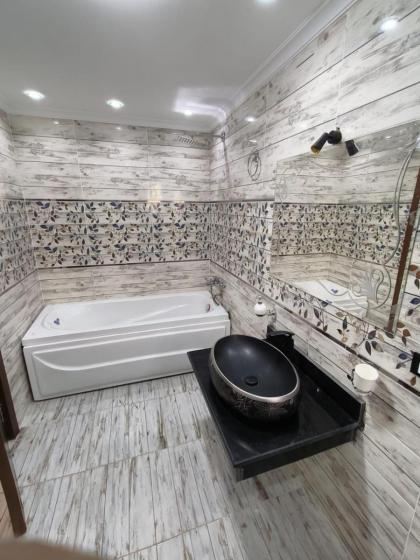شقة واسعة مريحة بكافة الامكانيات والفرش الحديث في المهندسين قريب من النيل والمتحف وجامعة الدول - image 19