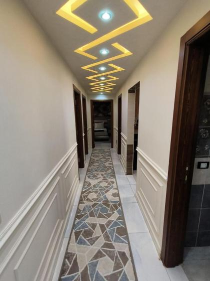 شقة واسعة مريحة بكافة الامكانيات والفرش الحديث في المهندسين قريب من النيل والمتحف وجامعة الدول - image 20
