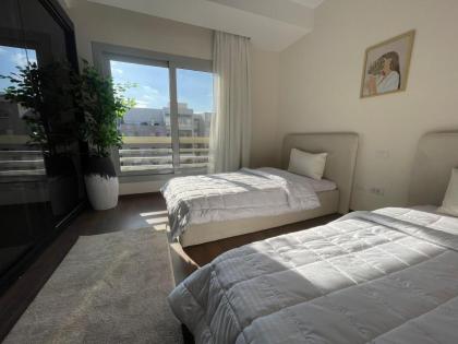 Cairo Festival City Cozy & Modern 3BR Apartment - image 11