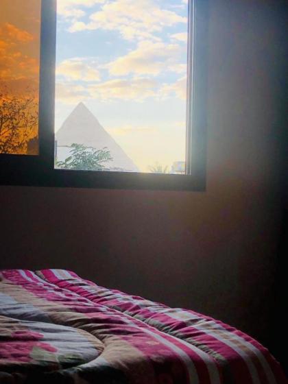 Happy house pyramids view - image 8