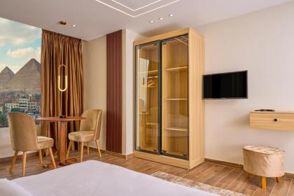 Rotana Pyramids View - image 11