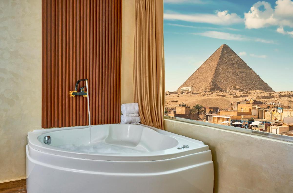 Cleopatra Tower Pyramids View - main image