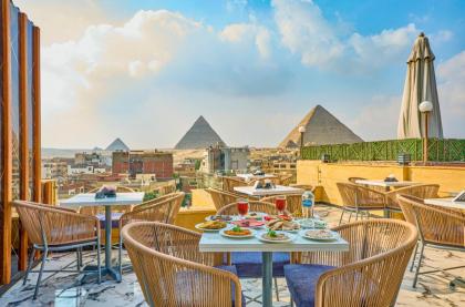 Cleopatra Tower Pyramids View - image 13