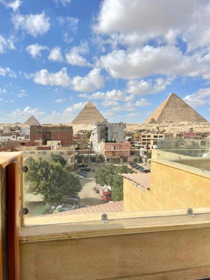 Cleopatra Tower Pyramids View - image 3